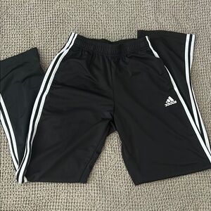 Adidas Black and White Track Pants with Iconic Stripes